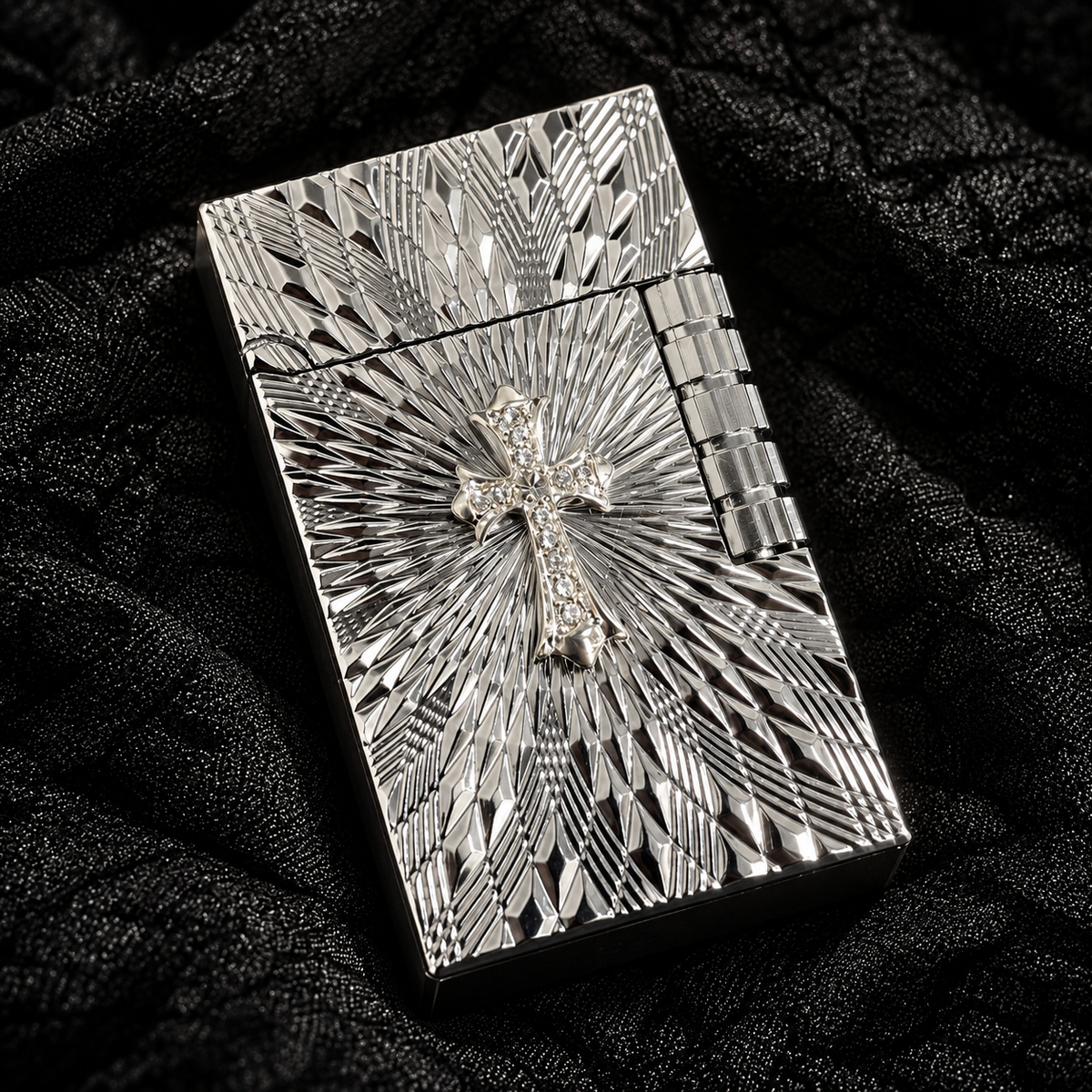 Close view of the engraved silver Crystal Cross lighter