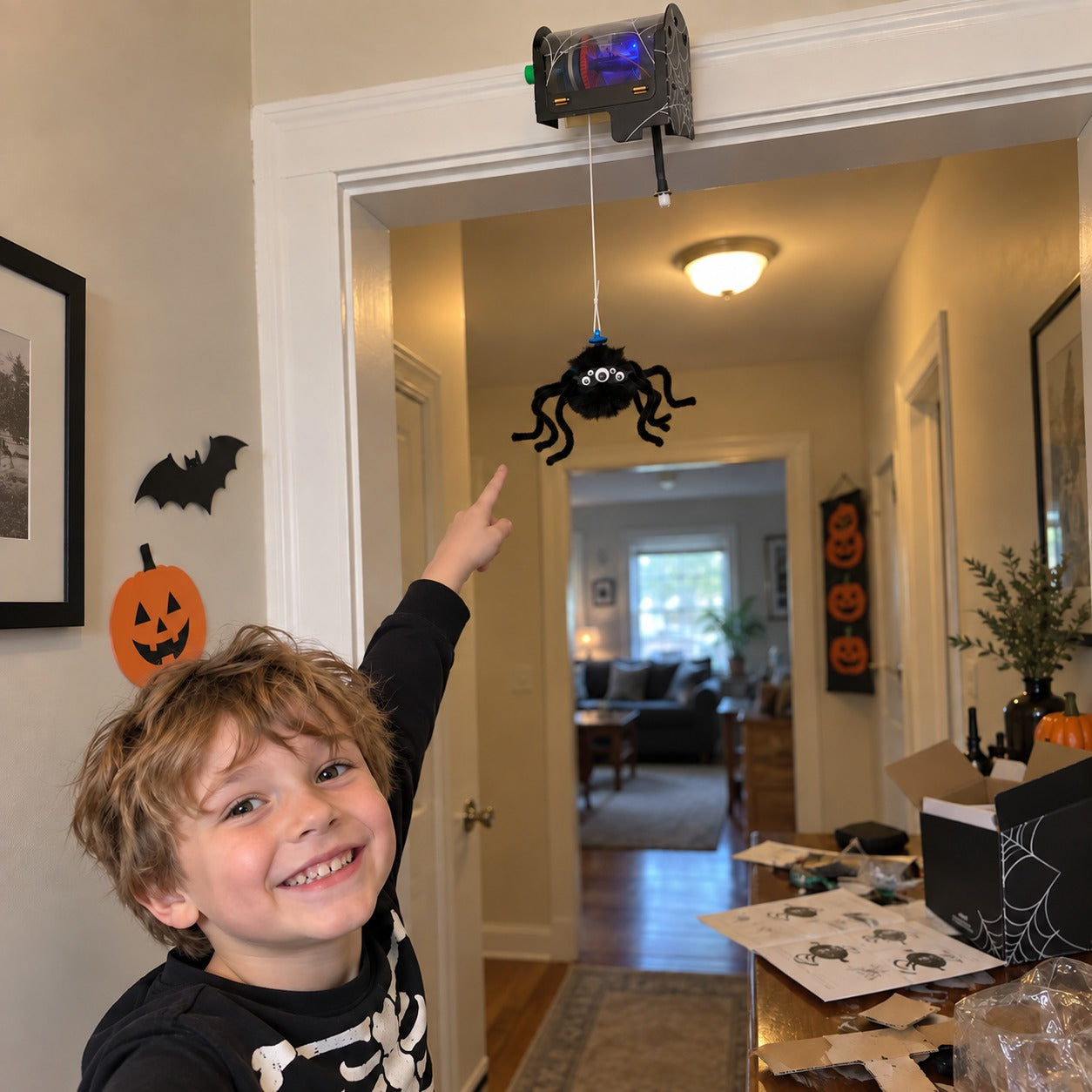 Illustrative buyer-style view of a completed motion-sensing spider mounted in a family hallway